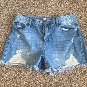 Distressed denim shorts